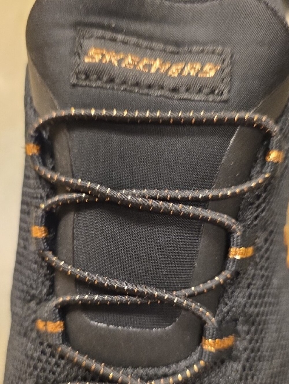 Skechers Women’s Black Slip-On Knit Sneakers with Gold Accents, Size 7 - Picture 6 of 9